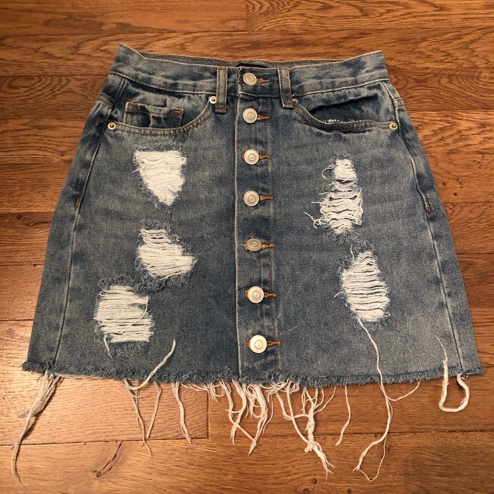 Distressed button skirt